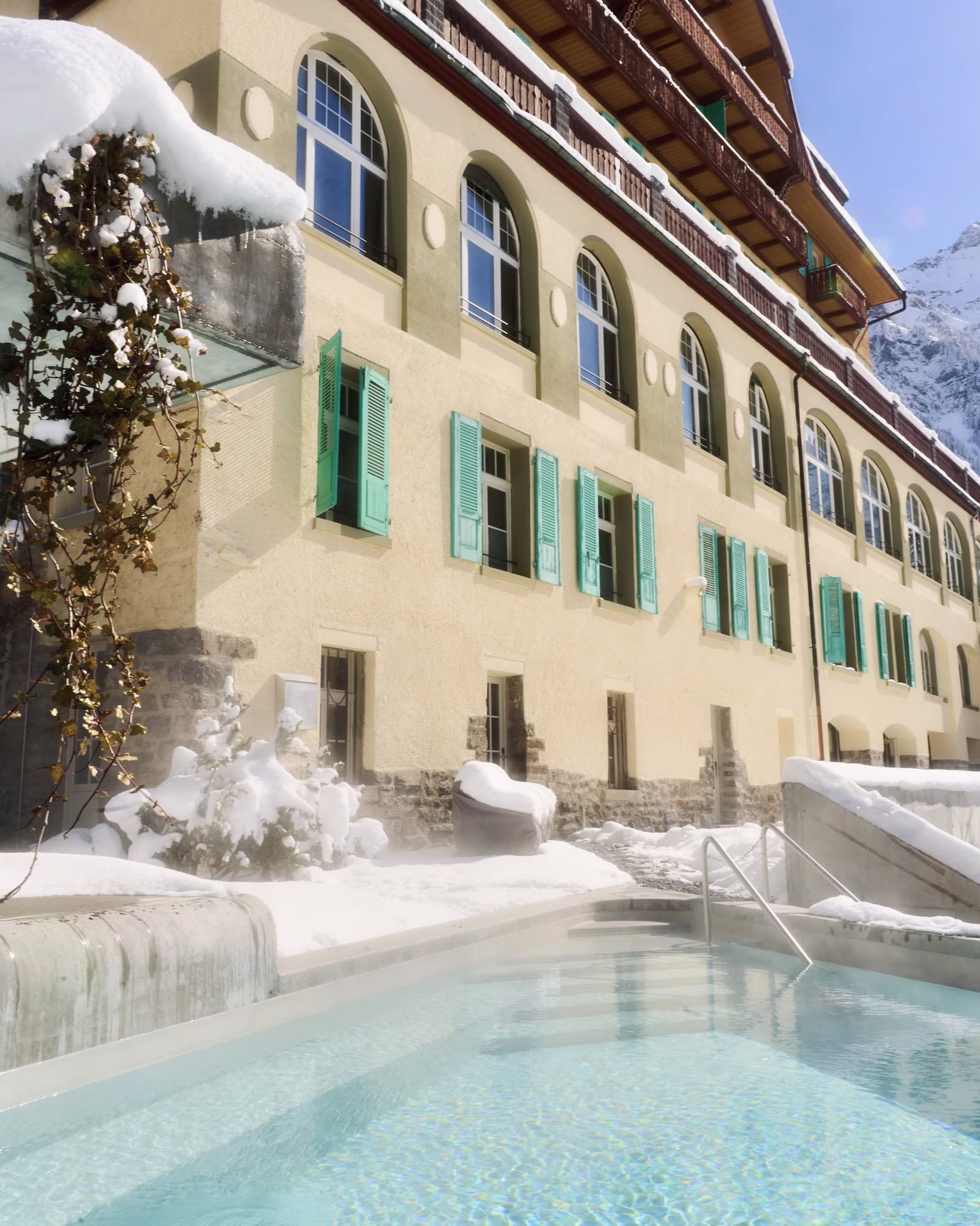 The heated outdoor pool beside Grand Hotel Belvedere in winter.