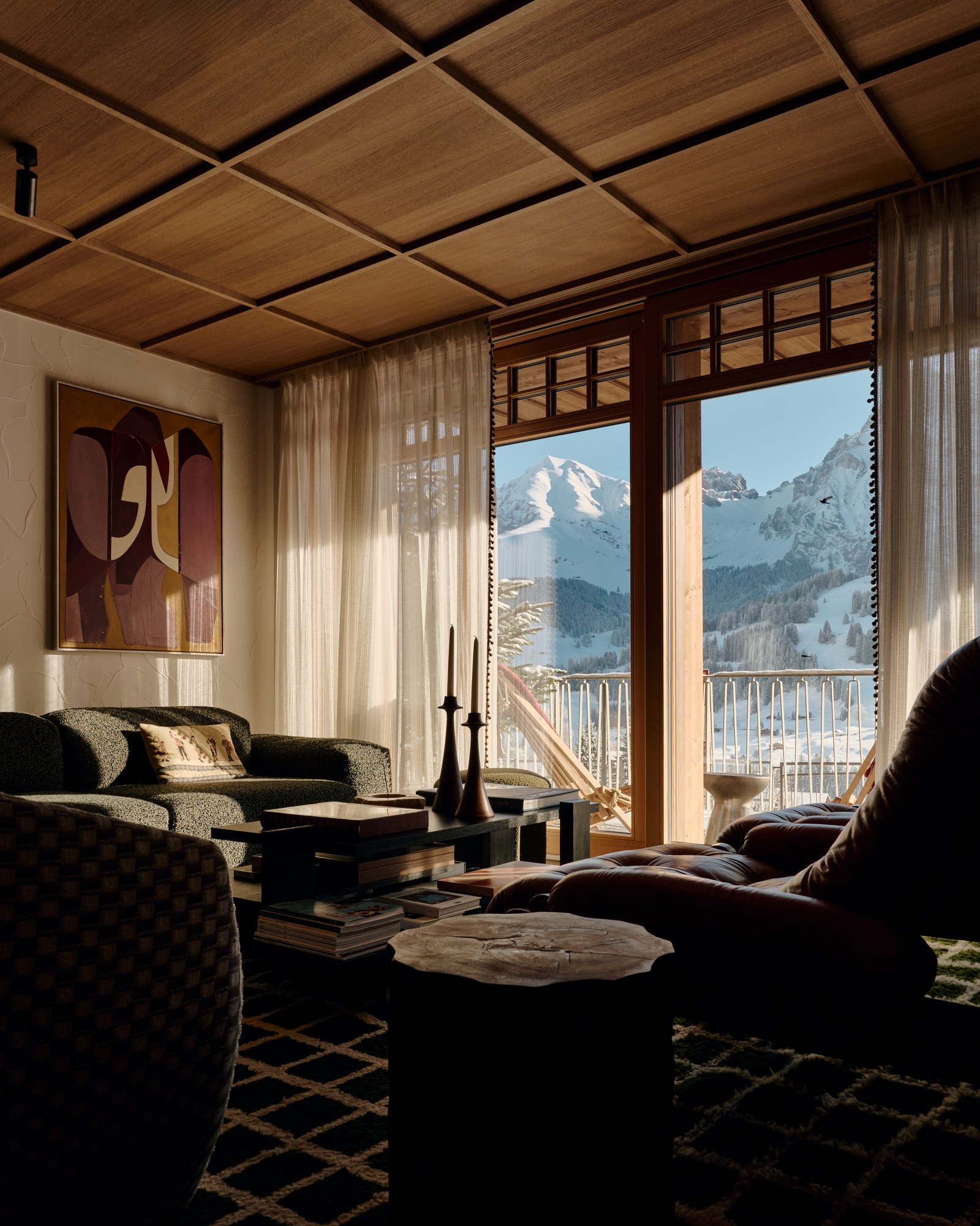 The Brecon lounge with framed Alpine views.